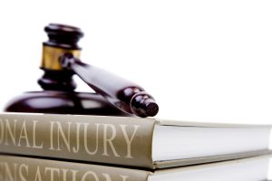 Personal injury - gavel on top of law books